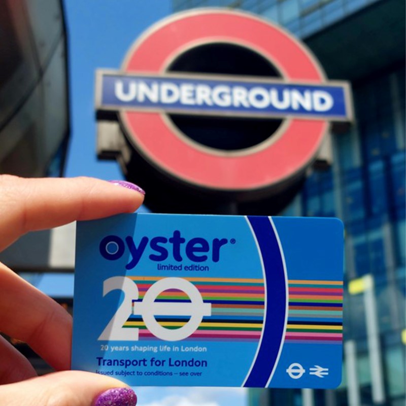 Person holding a limited edition Oyster card to celebrate 20 years of the iconic smartcard
